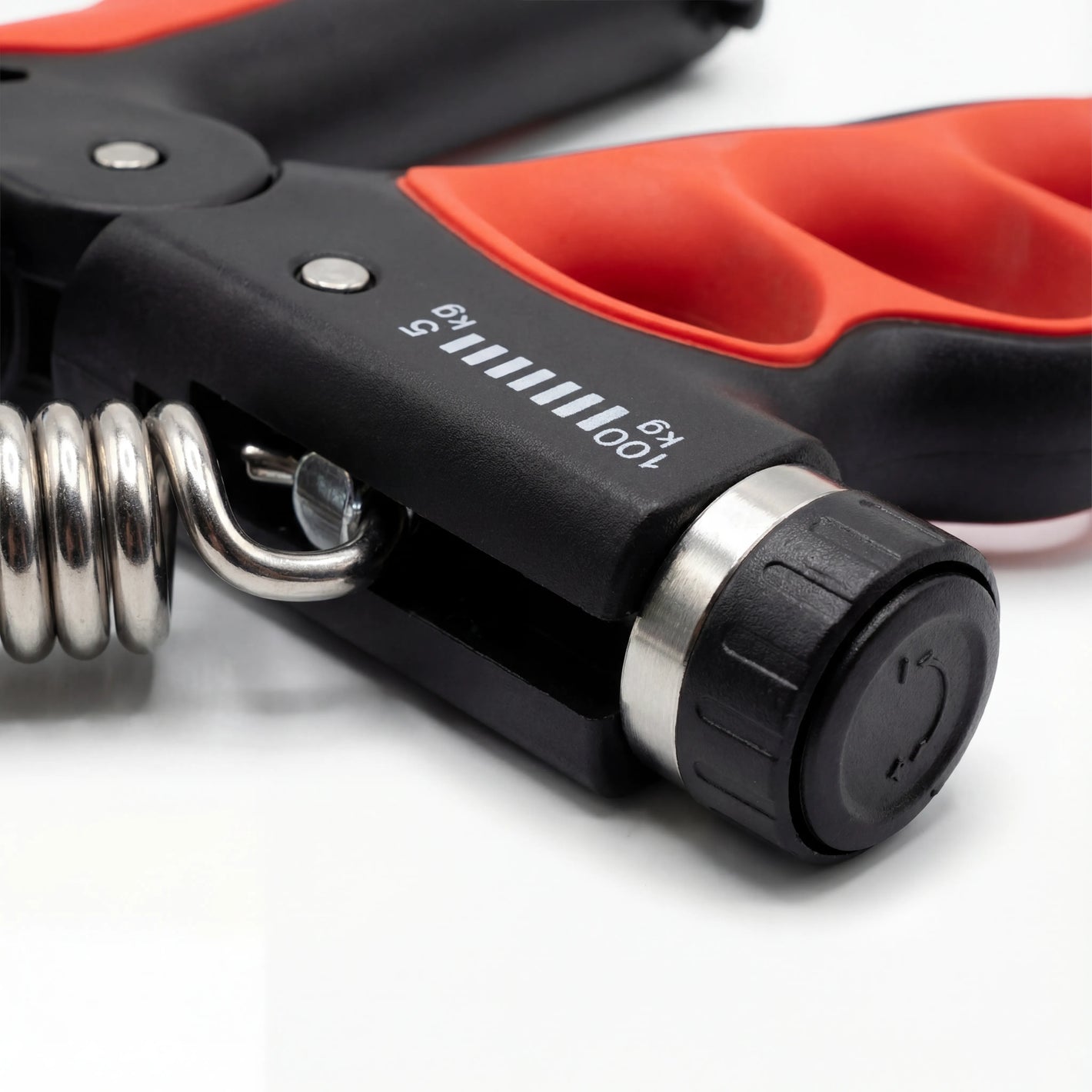 PowerGrip adjustable resistance dial showing 5–100 kg range for progressive grip strength training